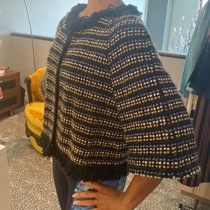 Sarah Campbell cropped 3/4 length sleeve sweater with fringe on neck and hem.